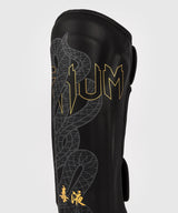 Protège-tibias Venum Serpenti – Noir/Or, VENUM-05757-109