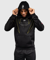 Venum x TEKKEN 8 Hoodie – Schwarz/Gelb – VENUM-06216-111